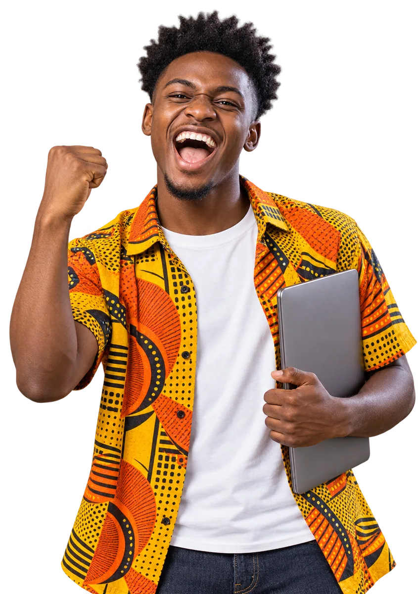 A young builder punching the air in celebration, a laptop under his arm
