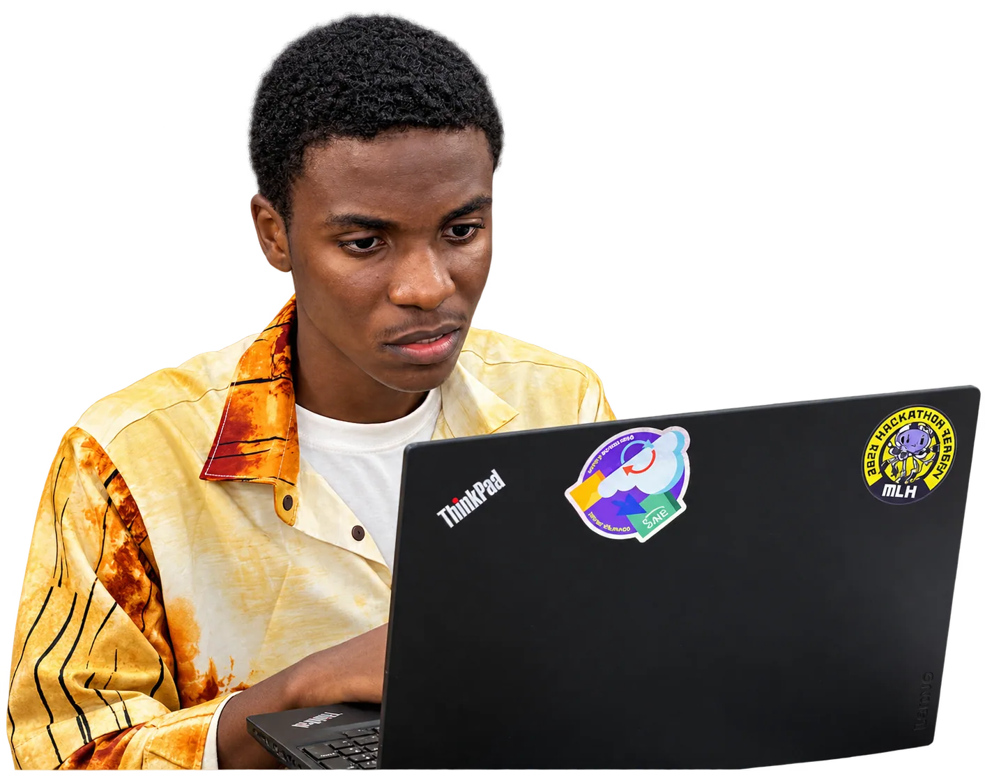 A builder coding on his laptop at Build Zero, UNILAG