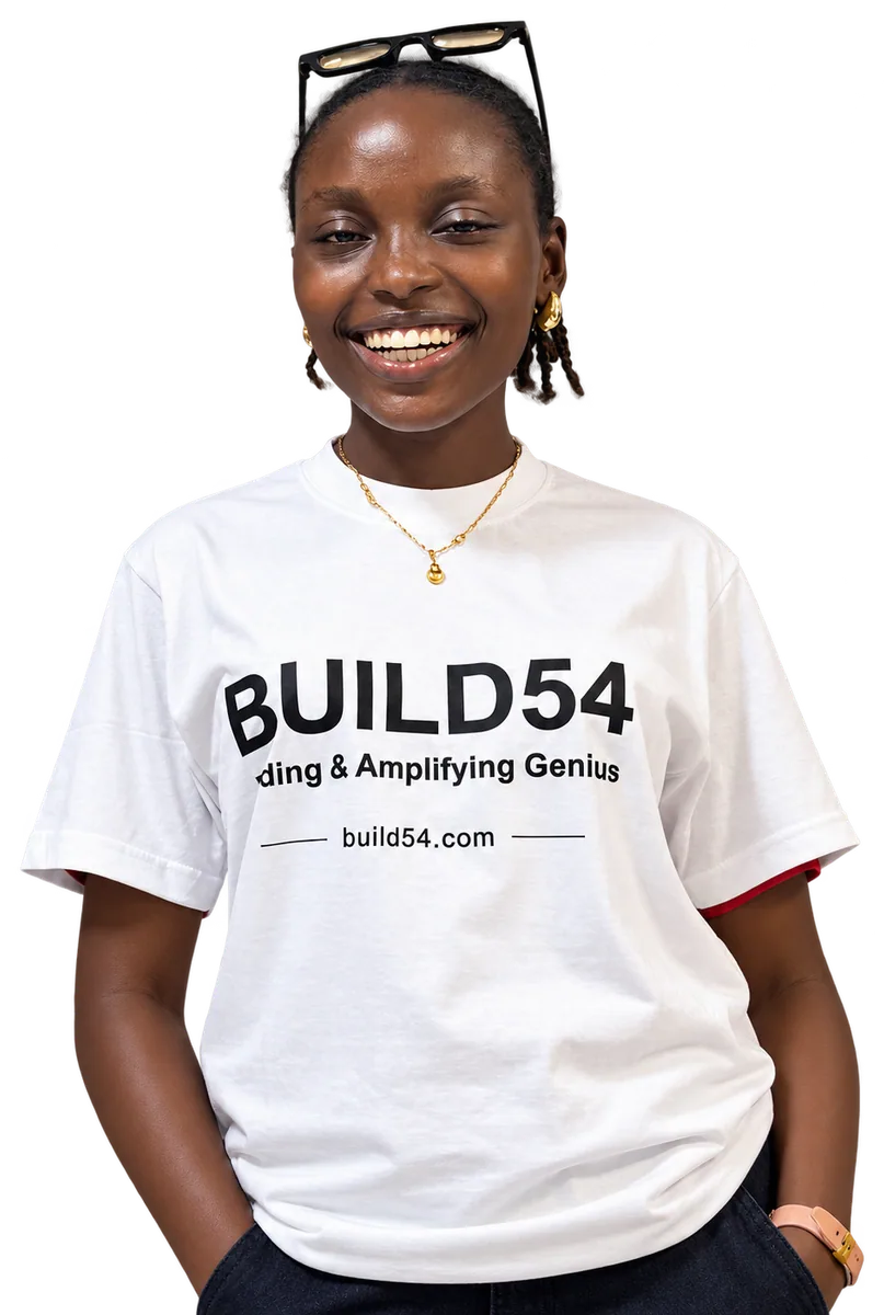 A smiling Build54 volunteer in a BUILD54 T-shirt at Build Zero, UNILAG